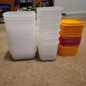 22 Plastic Tupperware Set Brand New. Never Used. 1 Stack Is 450ML And 1.1 Liter